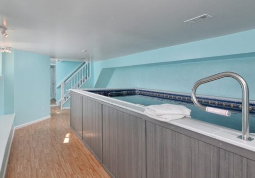 Residential basement spa conversion with a pool