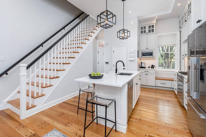 Philadelphia urban transitional kitchen with remodeled stairway by Bellweather Design-Build