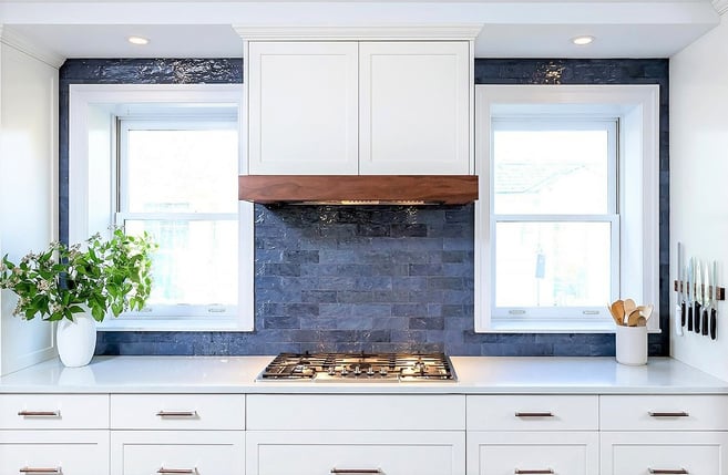 White Kitchen with Blue Accent Tile